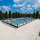 Azur Angle Poolüberdachung von Alukov 3,50 x 10,68 x 0,75 / 5-Silber RAL 9006-Tür rechts-120 mm